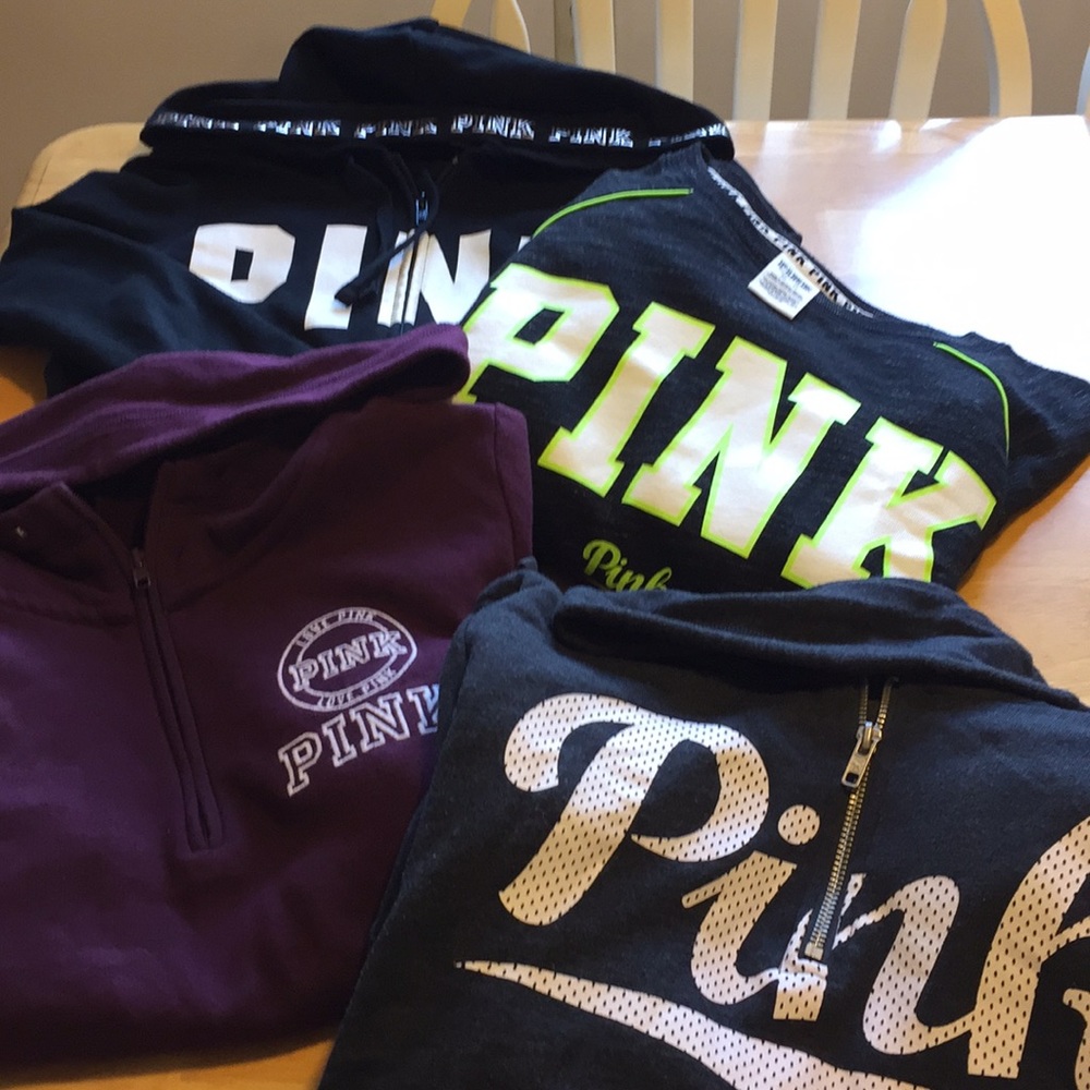 Four “PINK” XS sweatshirts